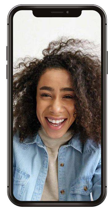 Video call on mobile with woman smiling into the camera